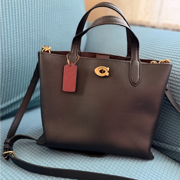 Coach Handbags - Coach Black Crossbody Bag with Gold Accents